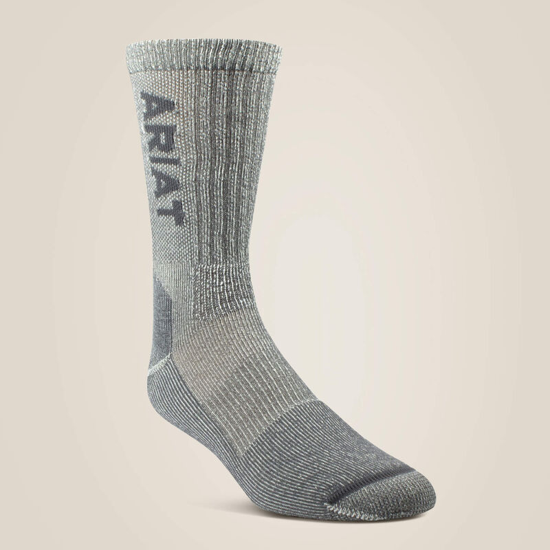 A single gray knit crew sock with a dark gray vertical ARIAT logo on the side, displayed against a solid light beige background.