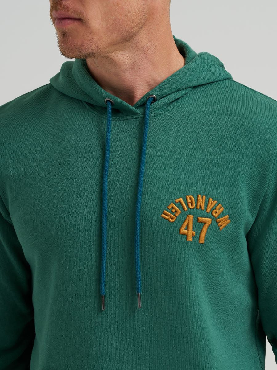 Green hoodie with 'Wangler 47' embroidery on a gray background