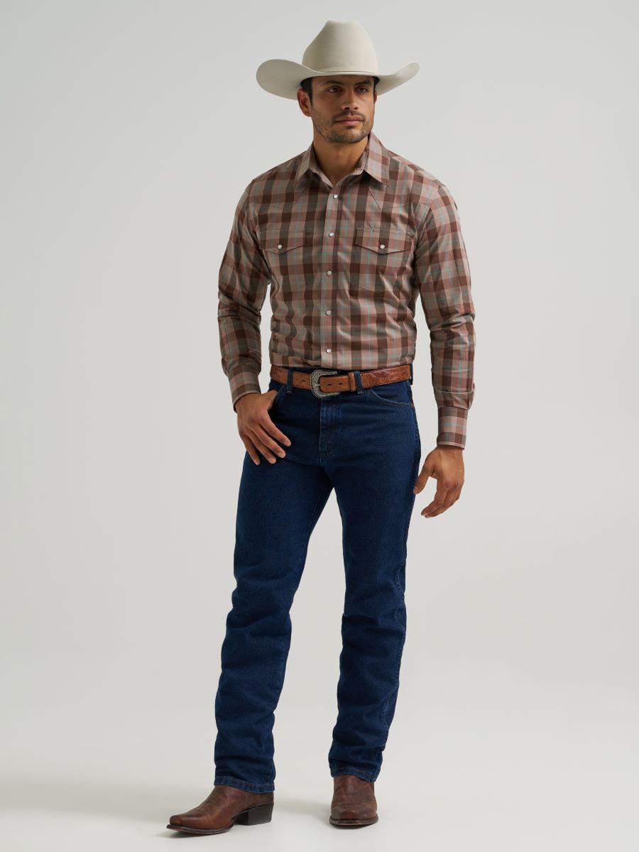 Man wearing a plaid Wrangler shirt, jeans, and cowboy hat on a white background