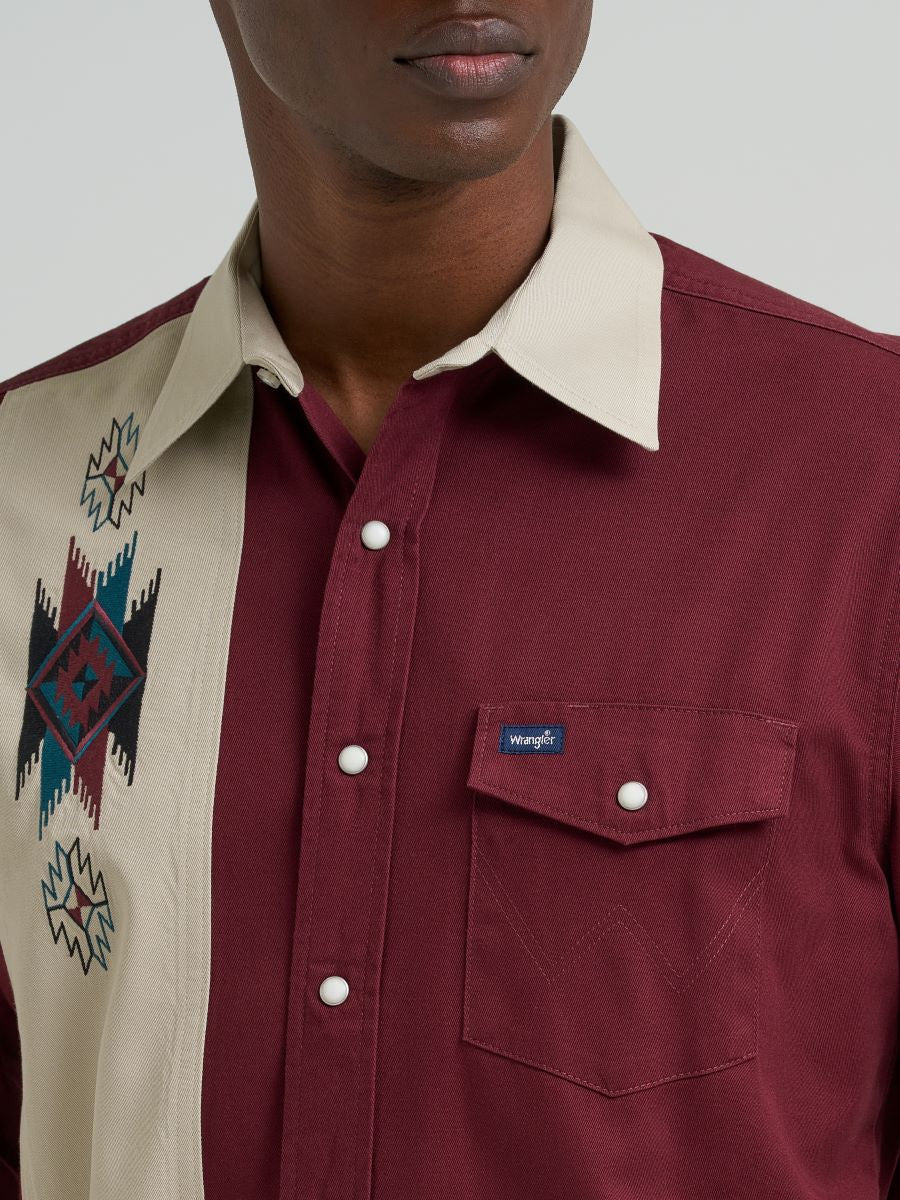 Maroon Wrangler shirt with a patterned collar and a visible brand logo on a neutral background