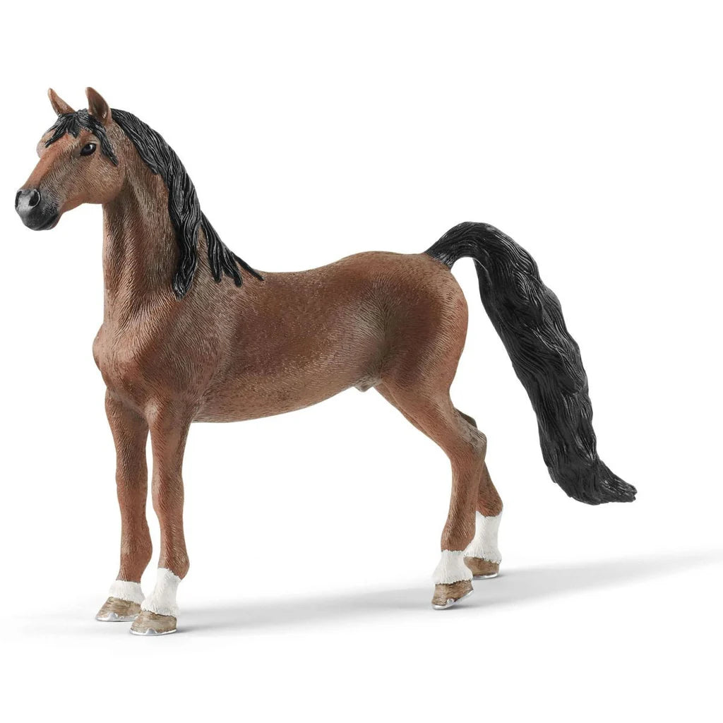 Schleich toy horse figure on a white background