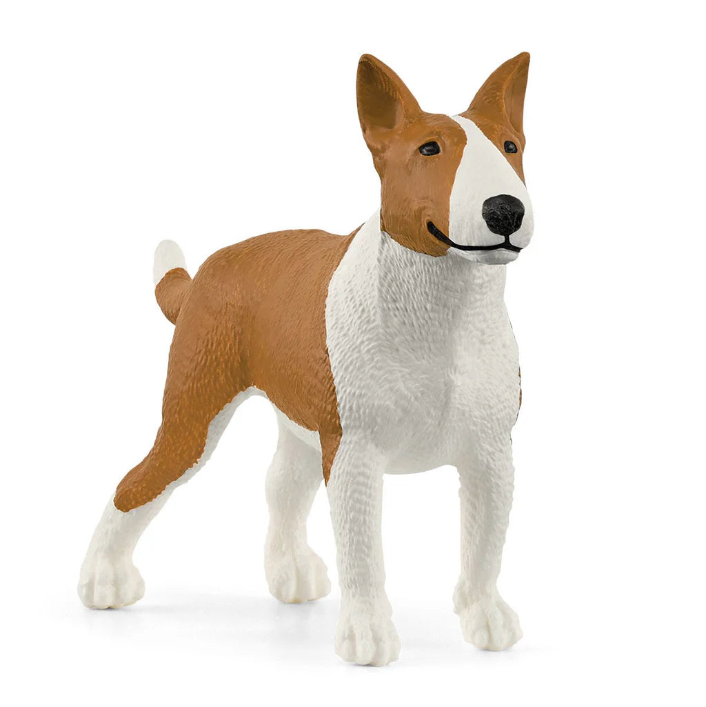 Schleich toy dog figurine with brown and white color pattern on a white background