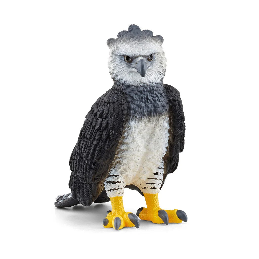 Schleich model of a harpy eagle on a white background