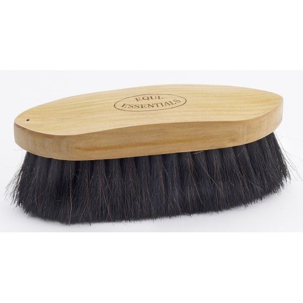 Bristle brush with wooden handle on a white background