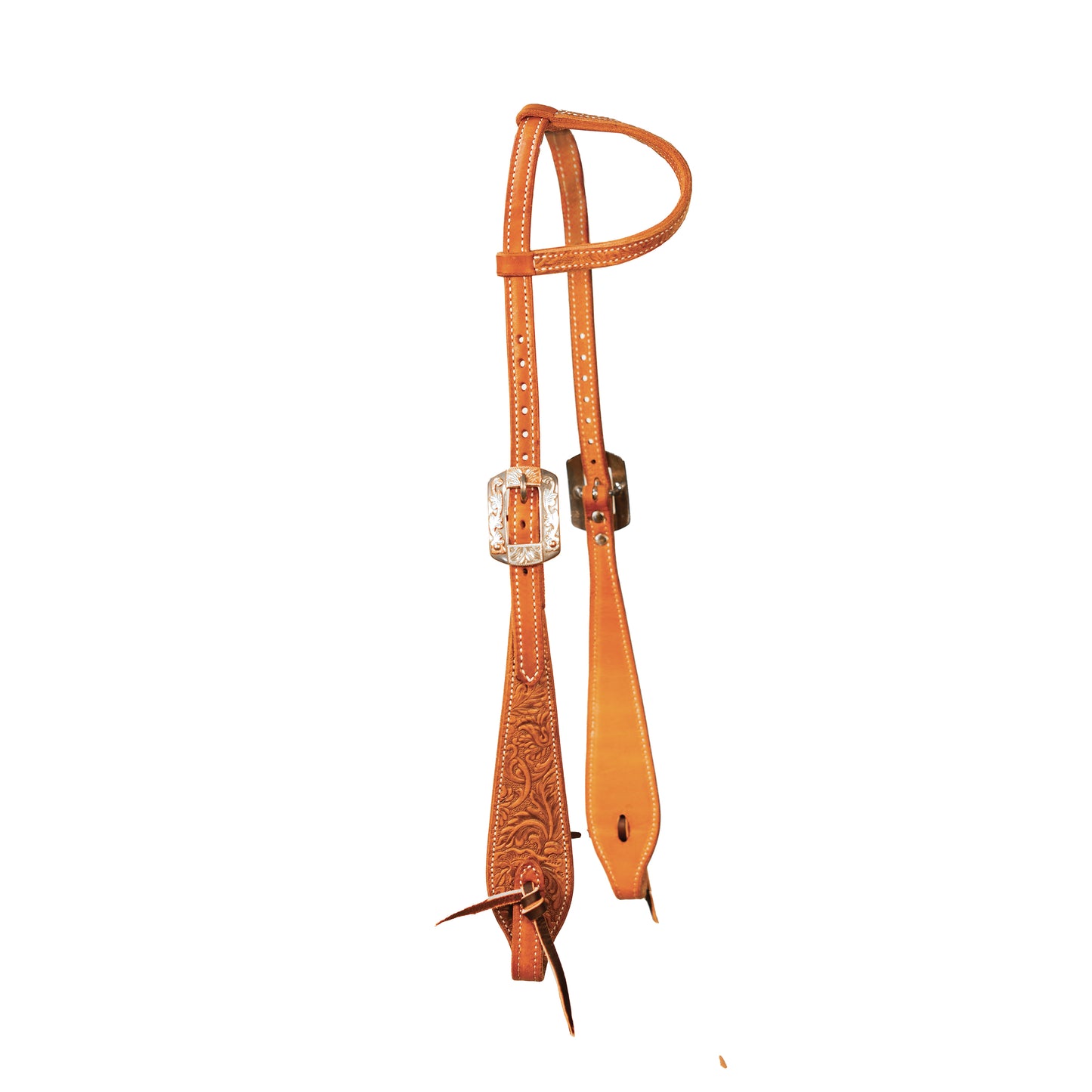 Brown leather bridle with decorated buckles on a white background