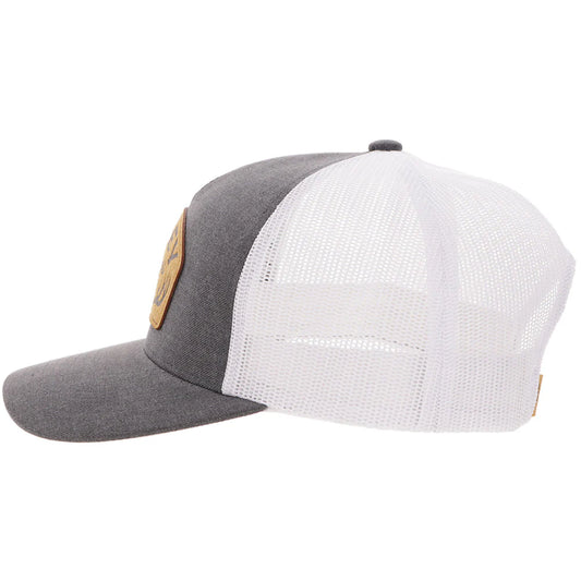 Gray and white Hooey cap with a patch on a white background