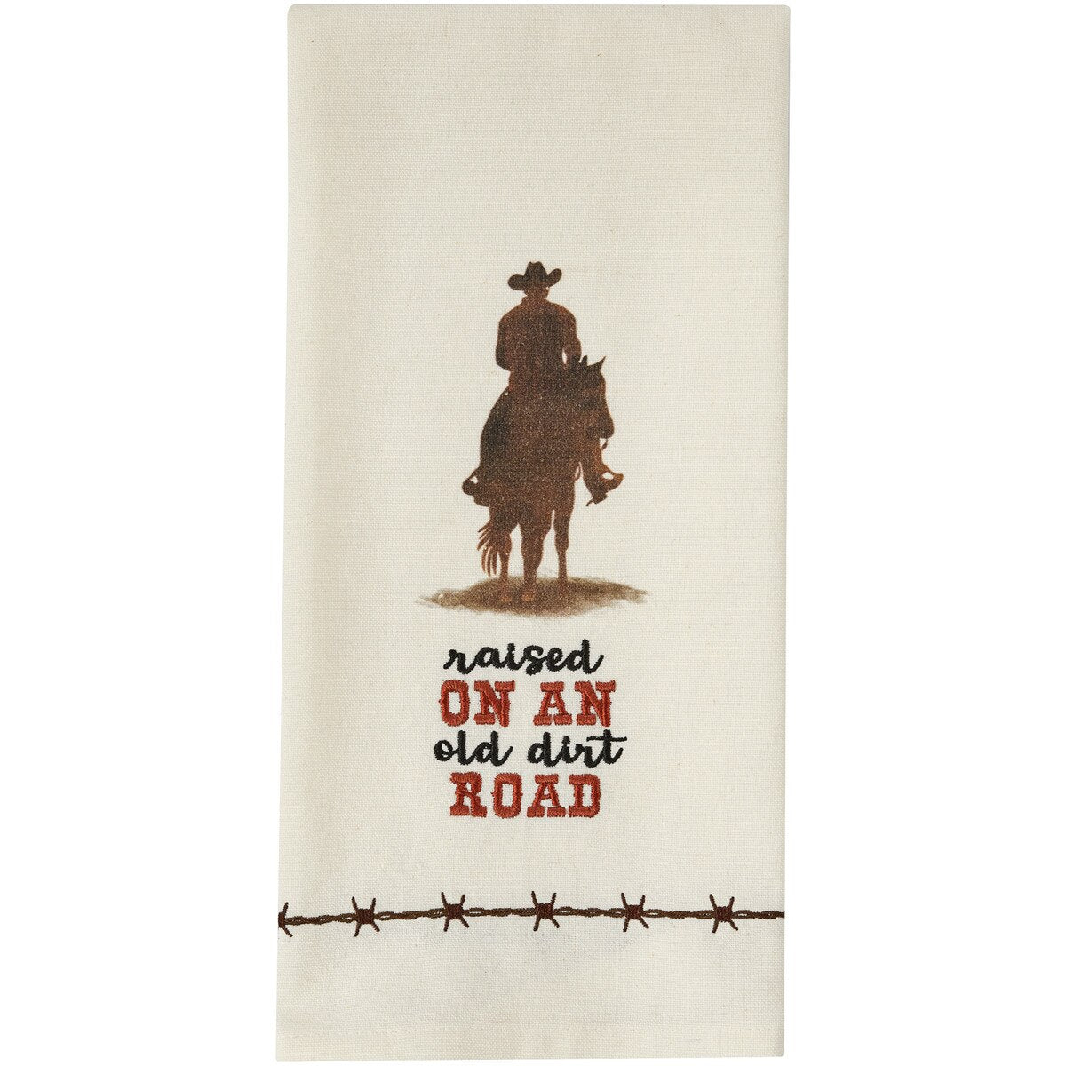Towel with a cowboy graphic and text 'raised on an old dirt road' on a white background