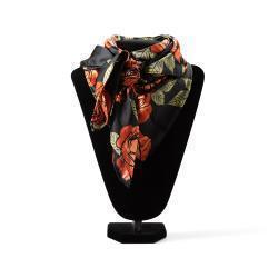 Floral patterned Ariat scarf on a black mannequin bust against a white background