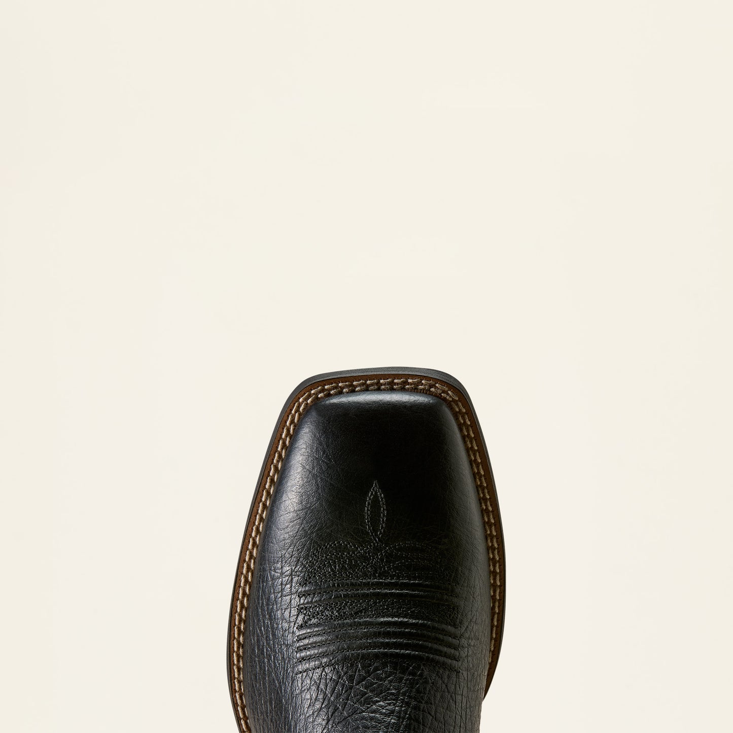 a close up of a black wide square toe boot