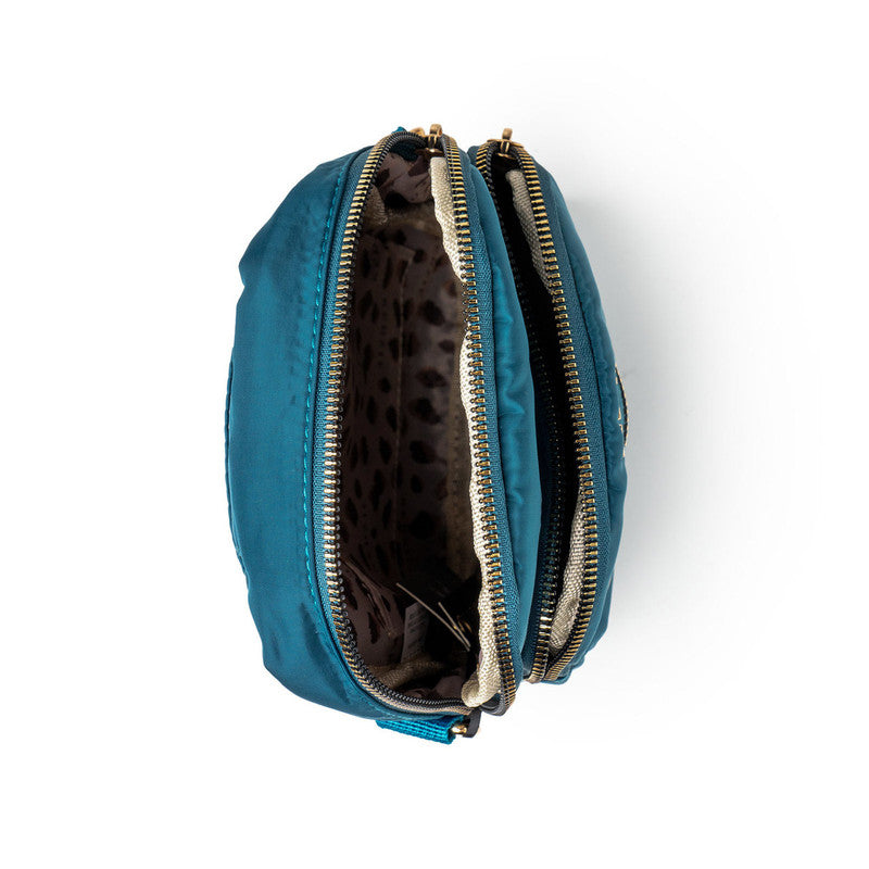 Blue Kedzie pouch with a leopard print interior on a white background