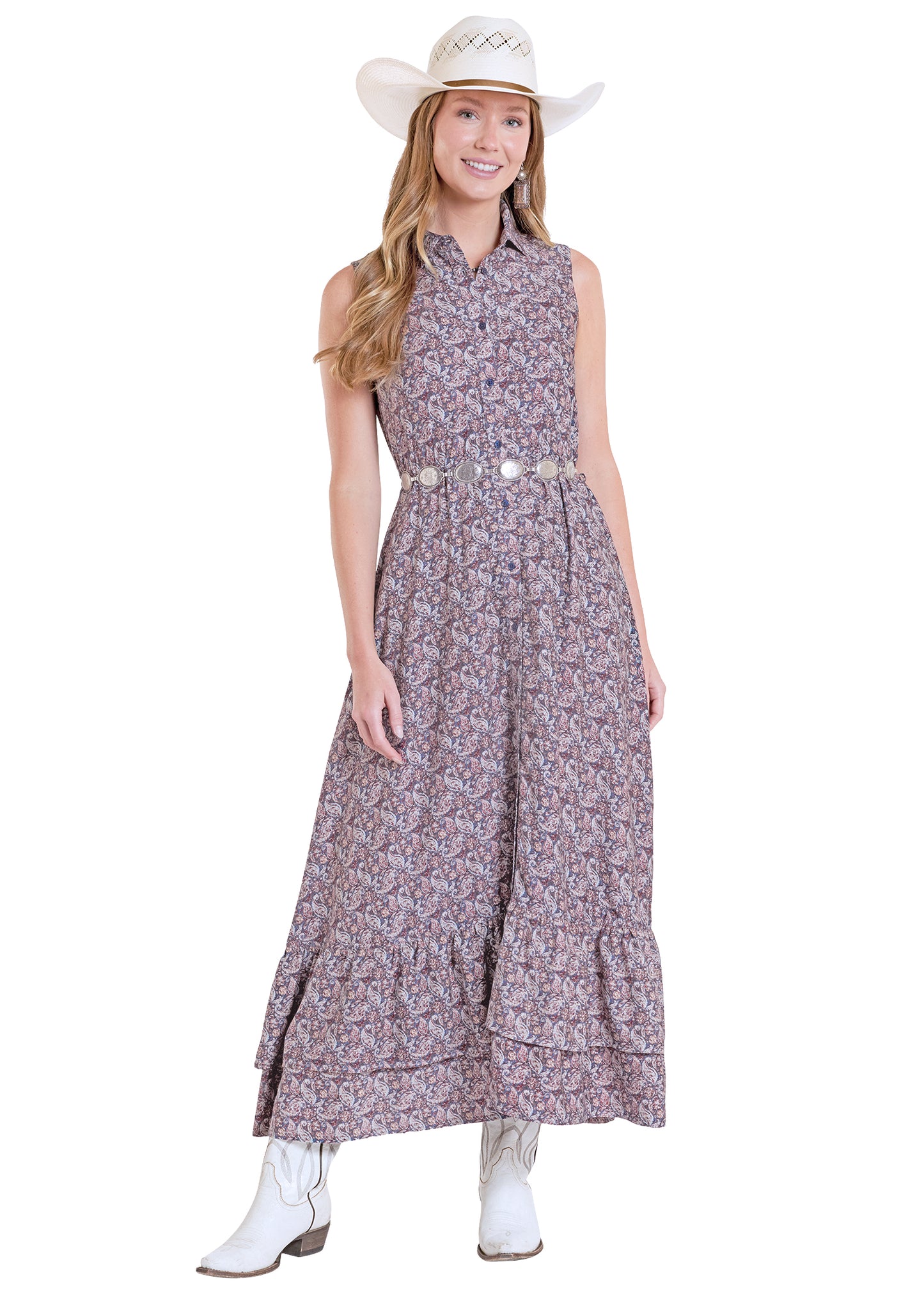 girl wearing a floral Panhandle Slim dreess, cowboy boots and hat on a white background