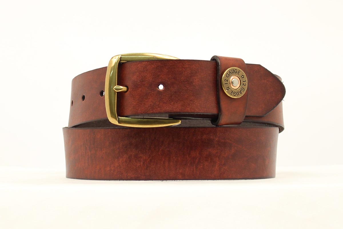 Brown leather Nocona belt with a Shotgun Shell accent on a white background