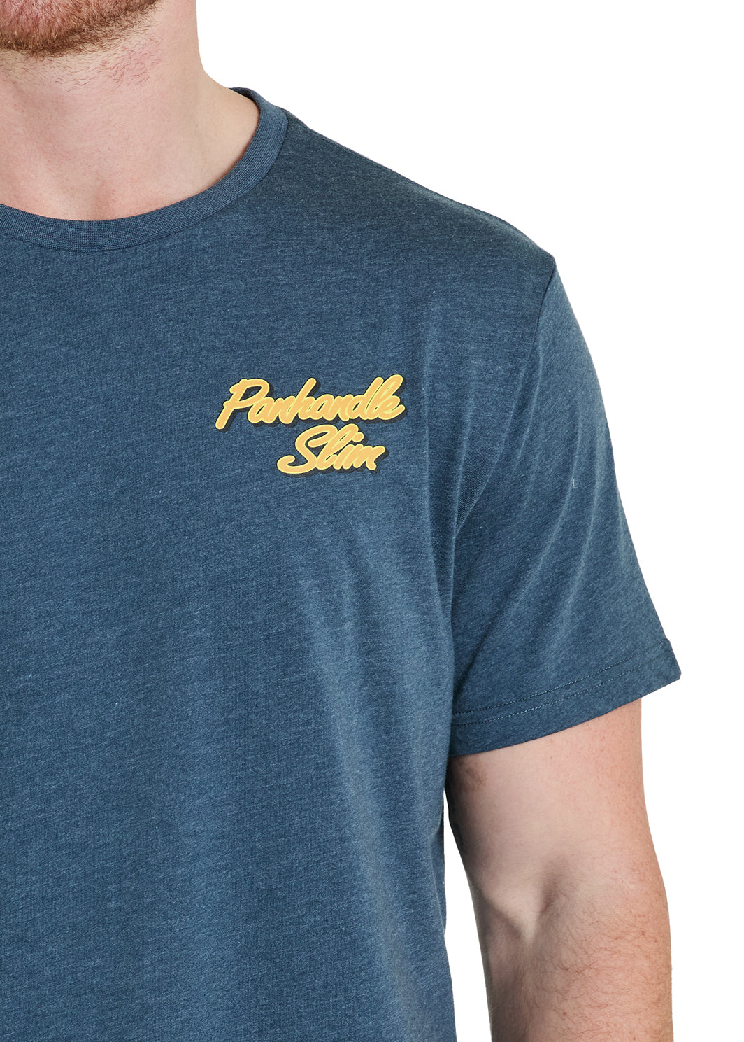Man wearing a blue Panhandle Slim t shirt on a white background