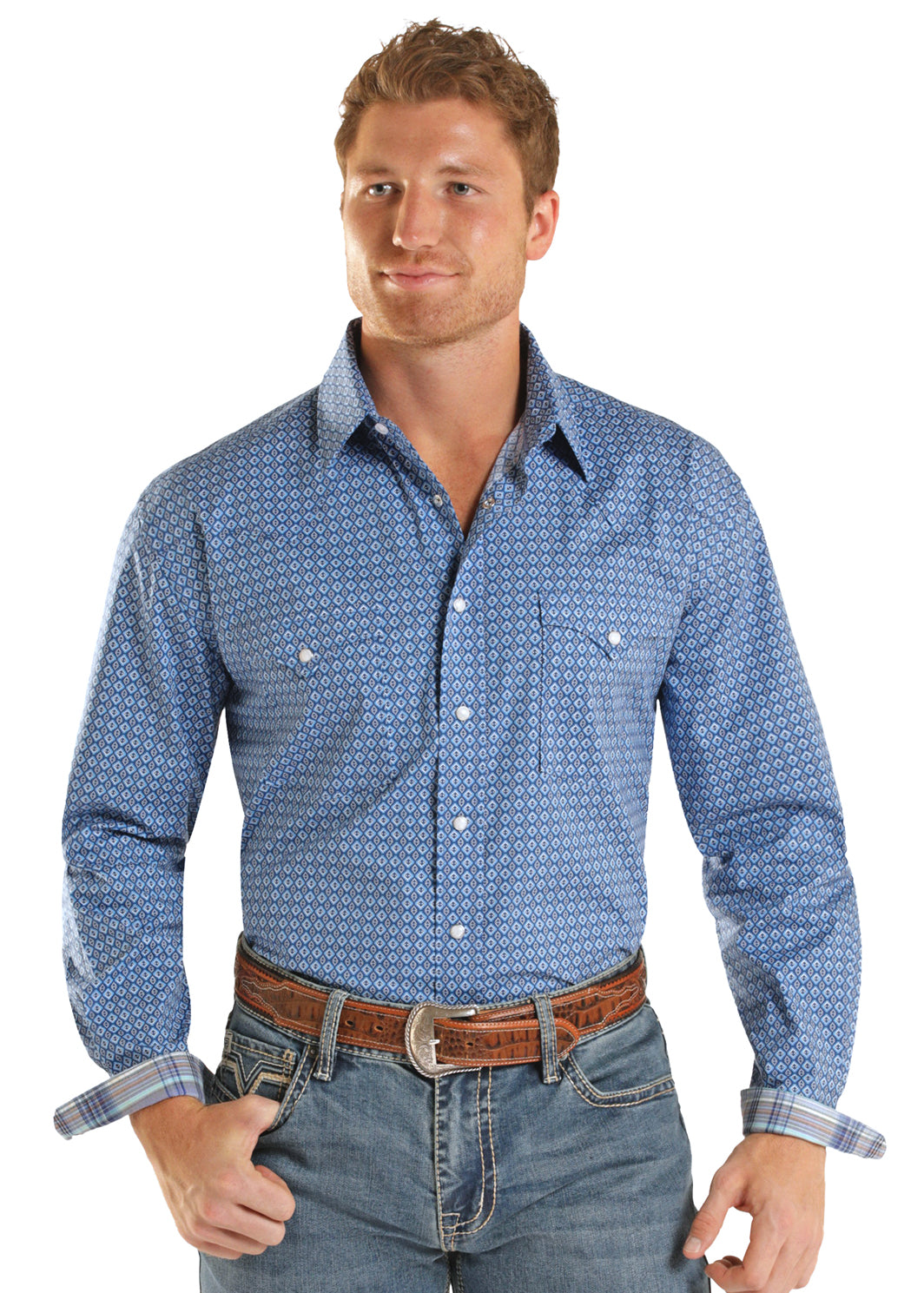 man wearing a blue Panhandle Slim shirt with blue jeans and a belt on a white background