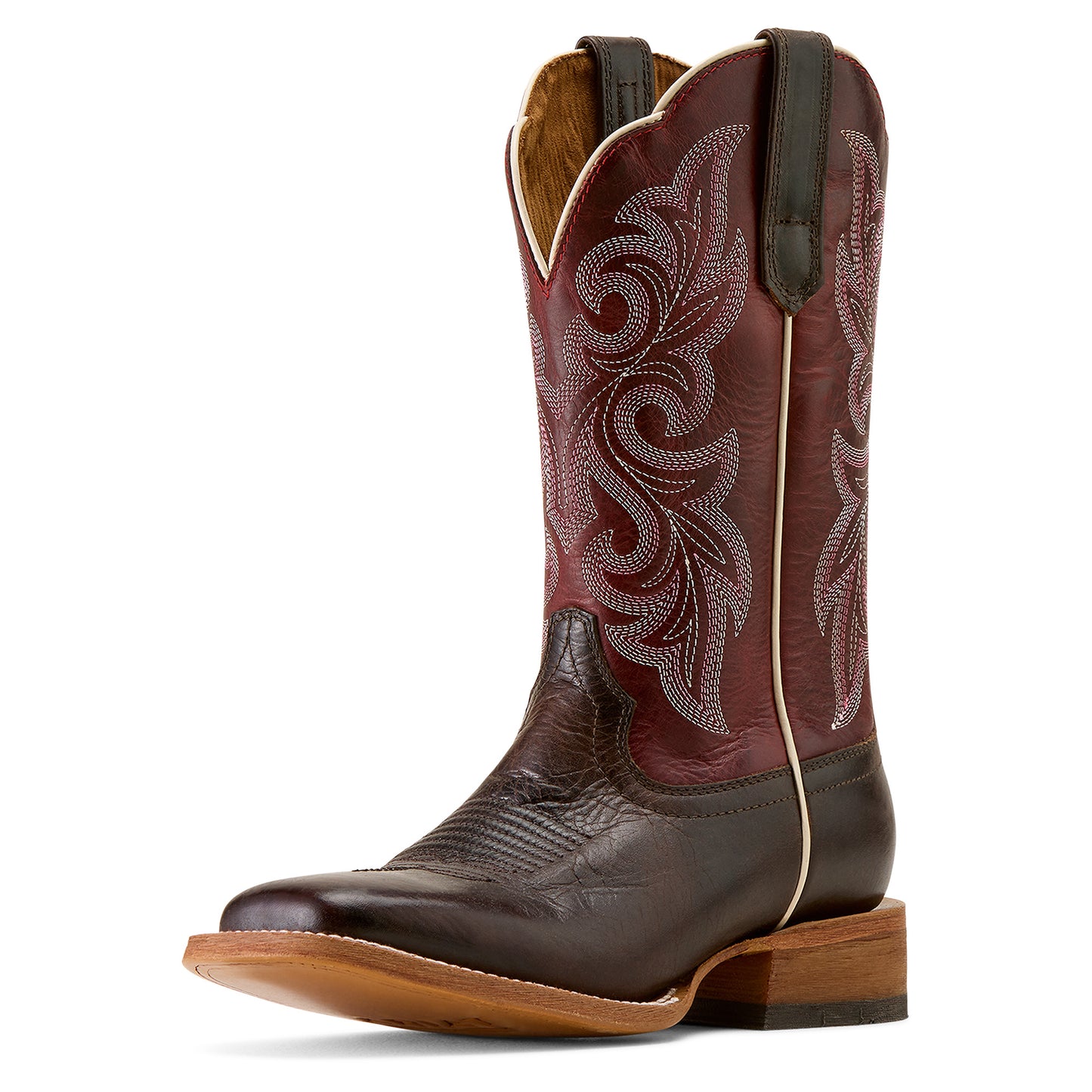 Brown and red ariat cowboy boot with intricate white embroidery on a white background