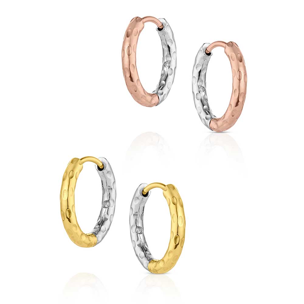 Set of four Montana Silversmiths gold and silver hoop earrings on a white background
