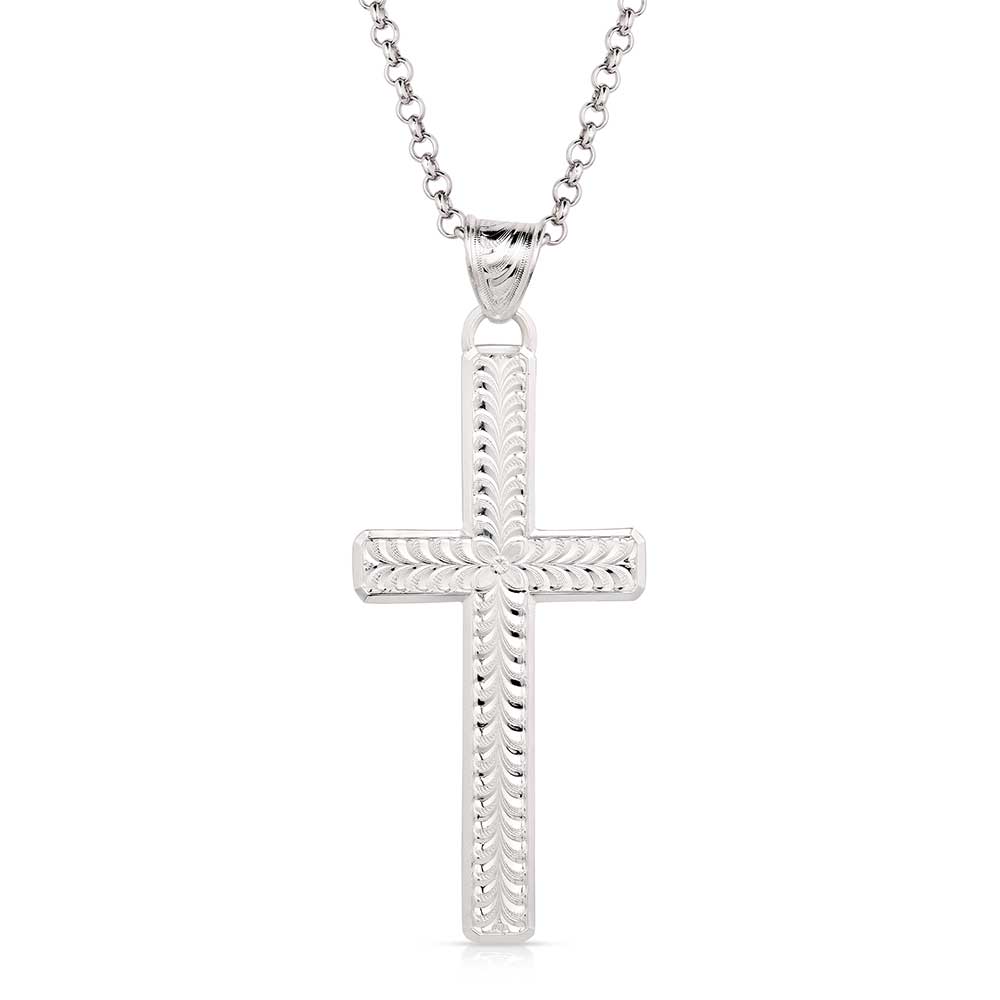 Montana Silversmiths Silver cross pendant on a chain against a white background