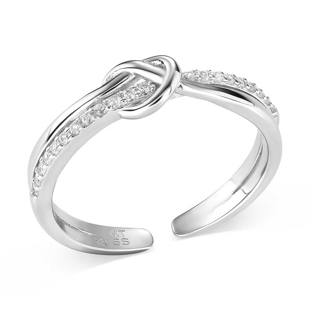 Silver Montana Silversmiths ring with diamond accents on a white background