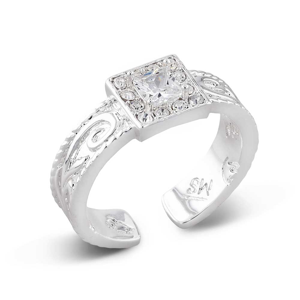 Silver Montana Silversmiths ring with a large diamond and intricate design on a white background