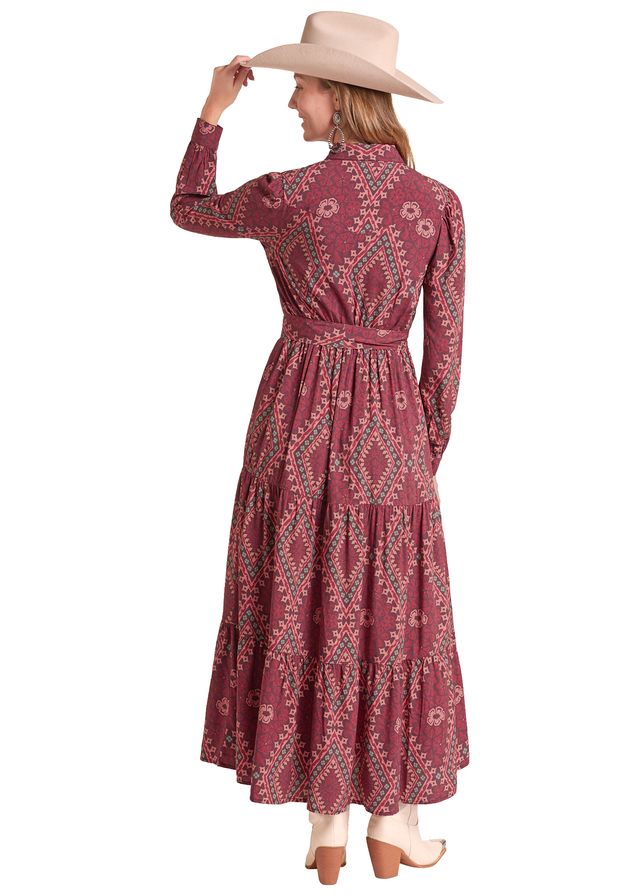 Woman wearing a red Panhandle Slim maxi dress for floral designs on a white background