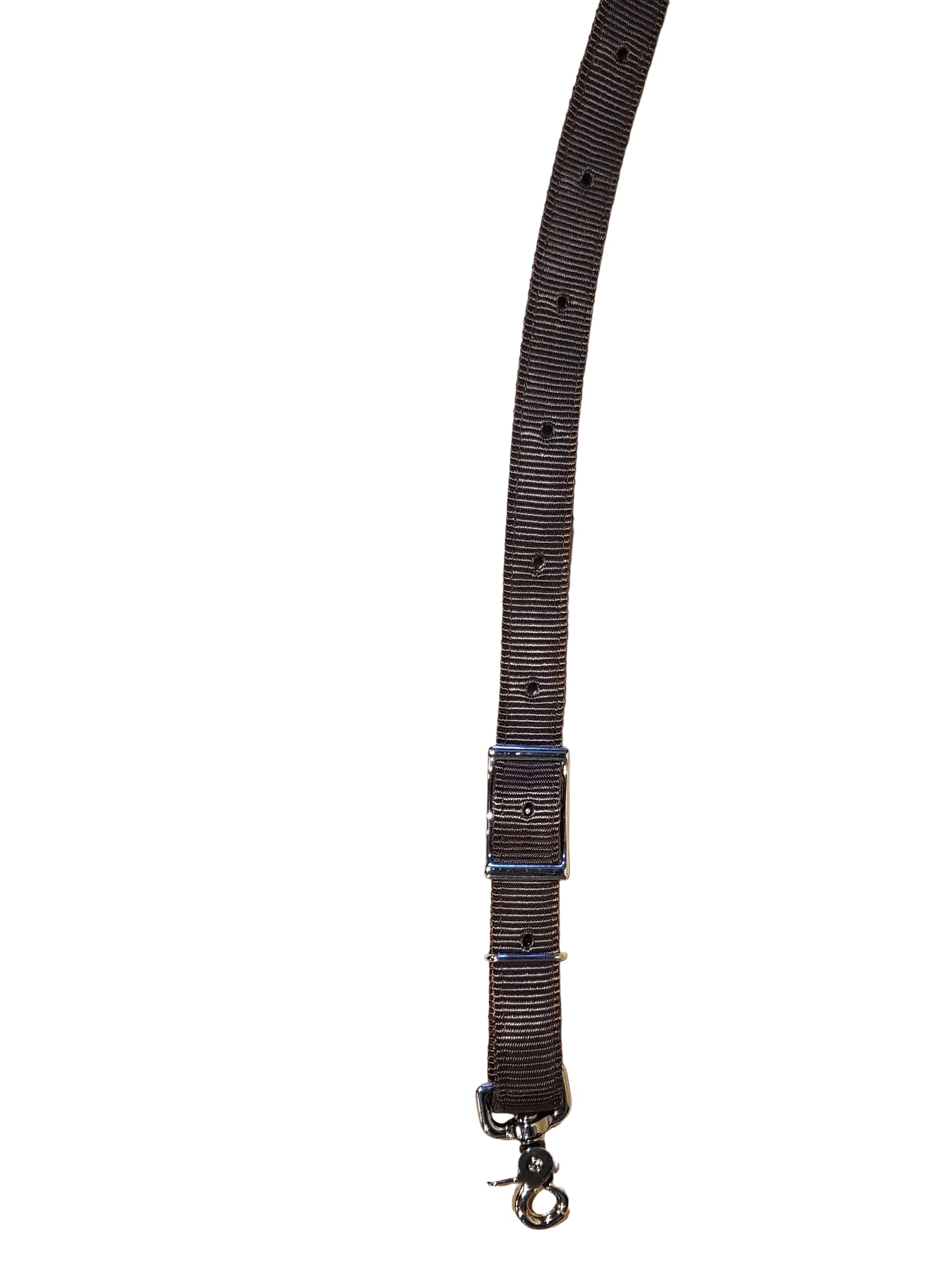 close up of brown nylon webbing and metal hardware on a white background