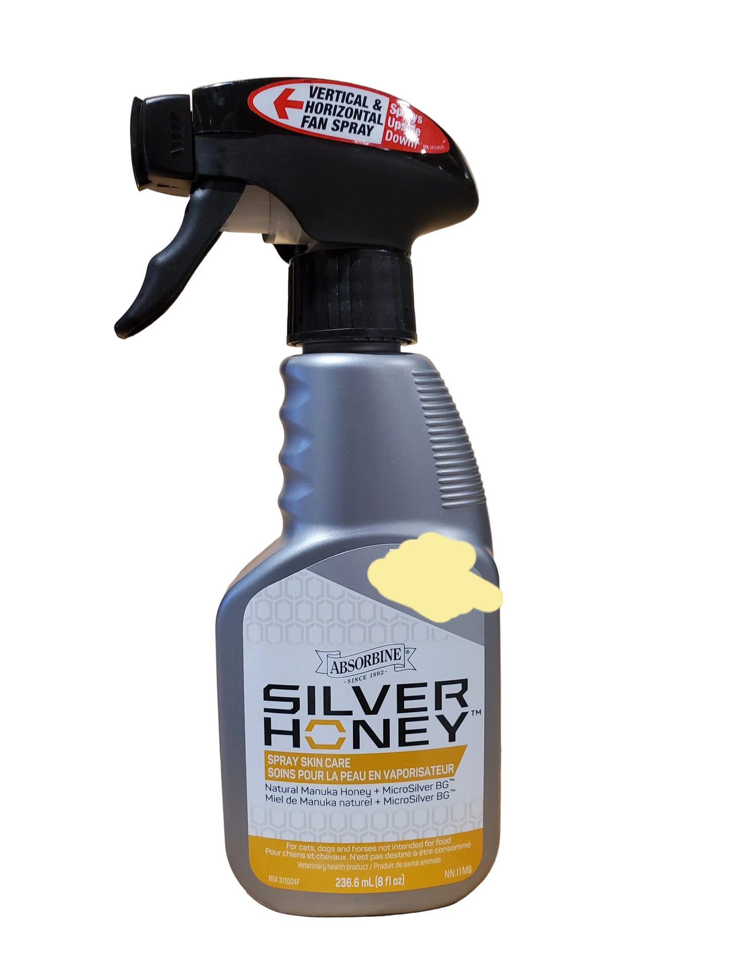 A spray bottle labeled Silver Honey™ Spray Skin Care, intended for pets and veterinary use, with a capacity of 236.6 ml.