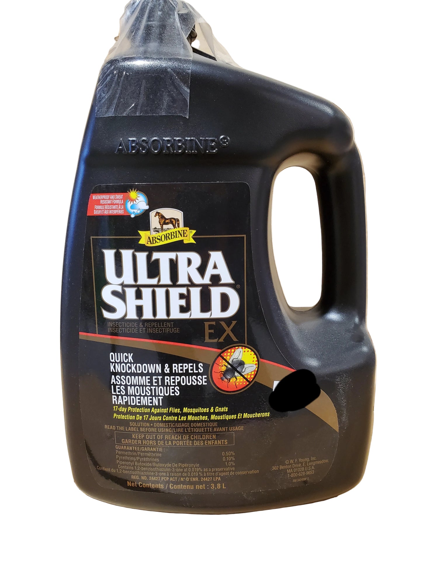 A spray bottle of Ultra Shield EX Insecticide & Repellent by Absorbine, designed for repelling biting insects from horses.