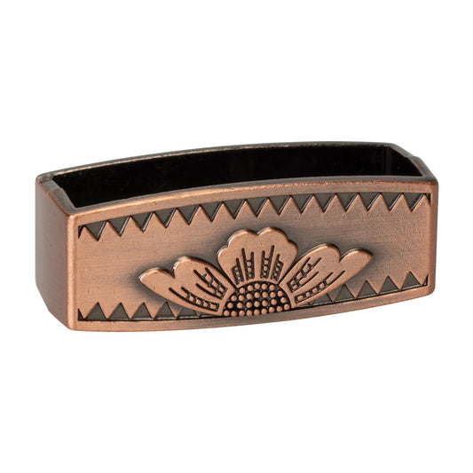 Bronze-colored belt loop with floral design on a white background