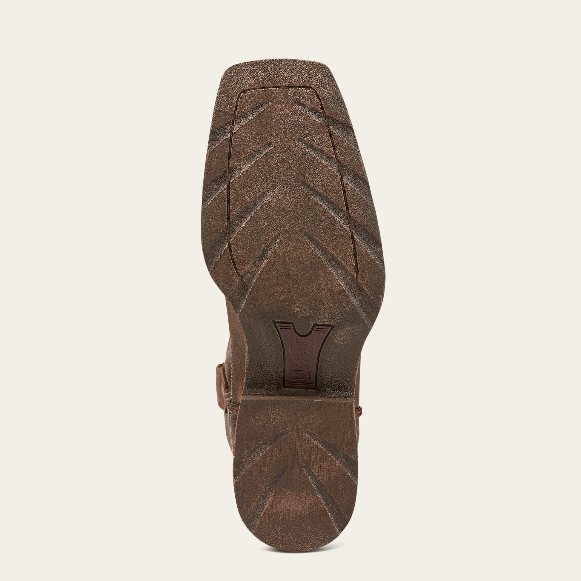 a brown scoured duratread outsole of a cowboy boot