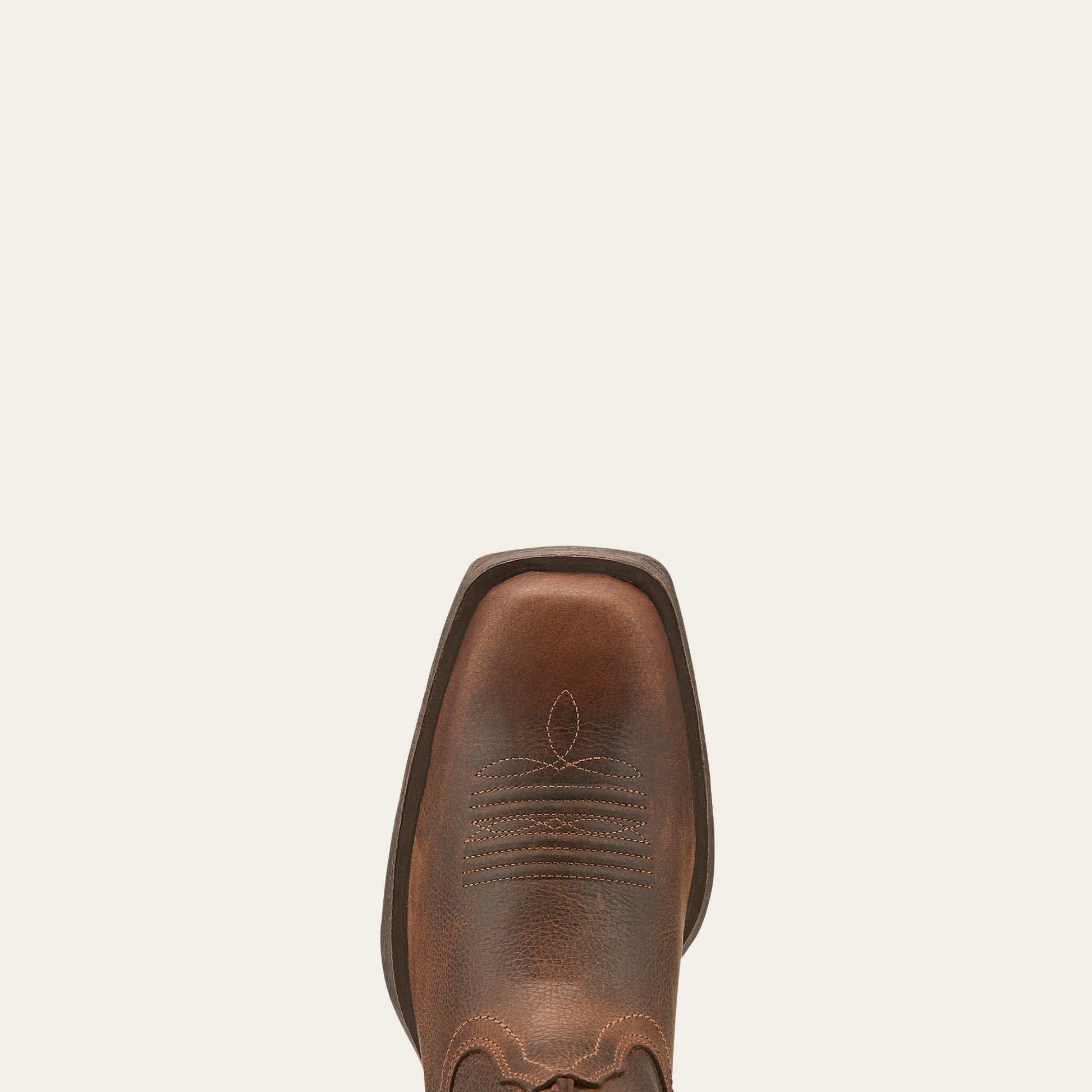 a close up of a brown square toe on a cowboy boot