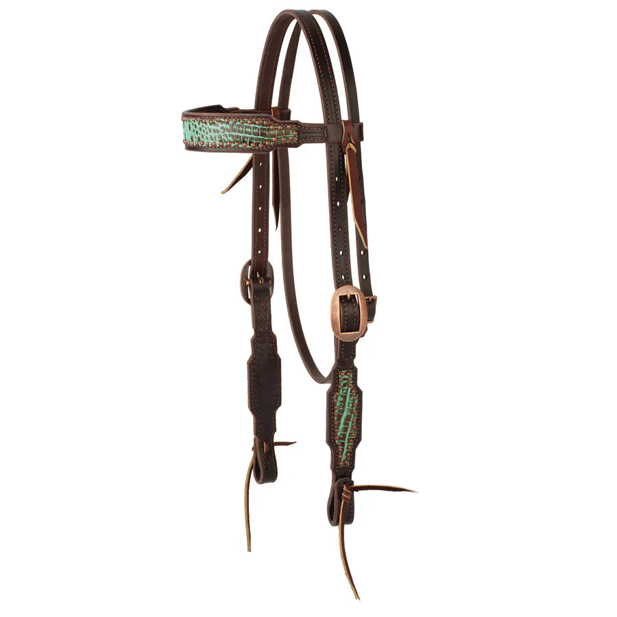 Brown leather Weaver horse bridle with turquoise croc overlay and copper spots on a white background