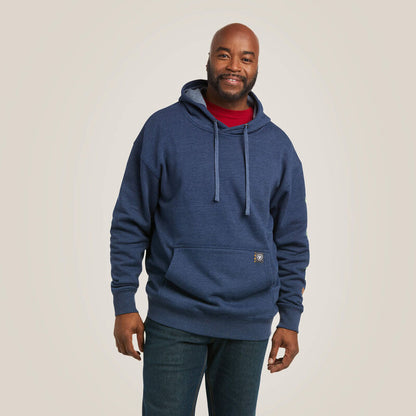 Man wearing a blue Ariat hoodie on a plain background