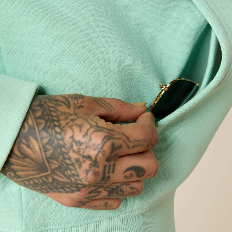 Light Green Ariat hoodie on a grey background