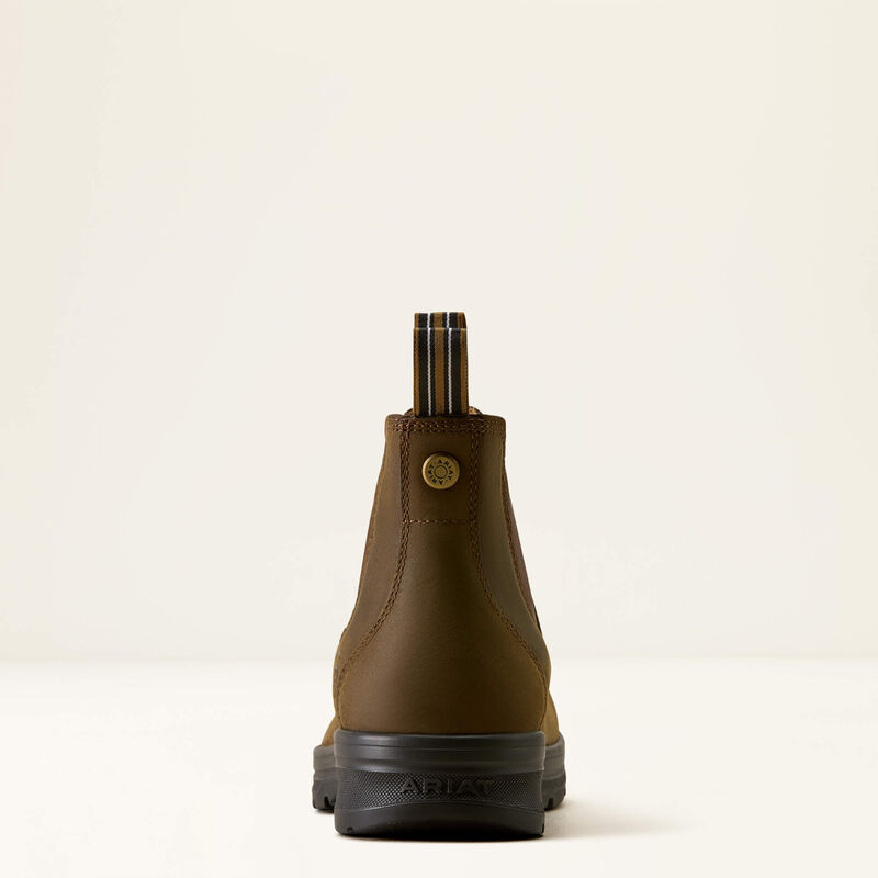 Pull on Ariat leather shoe in brown color on a white background