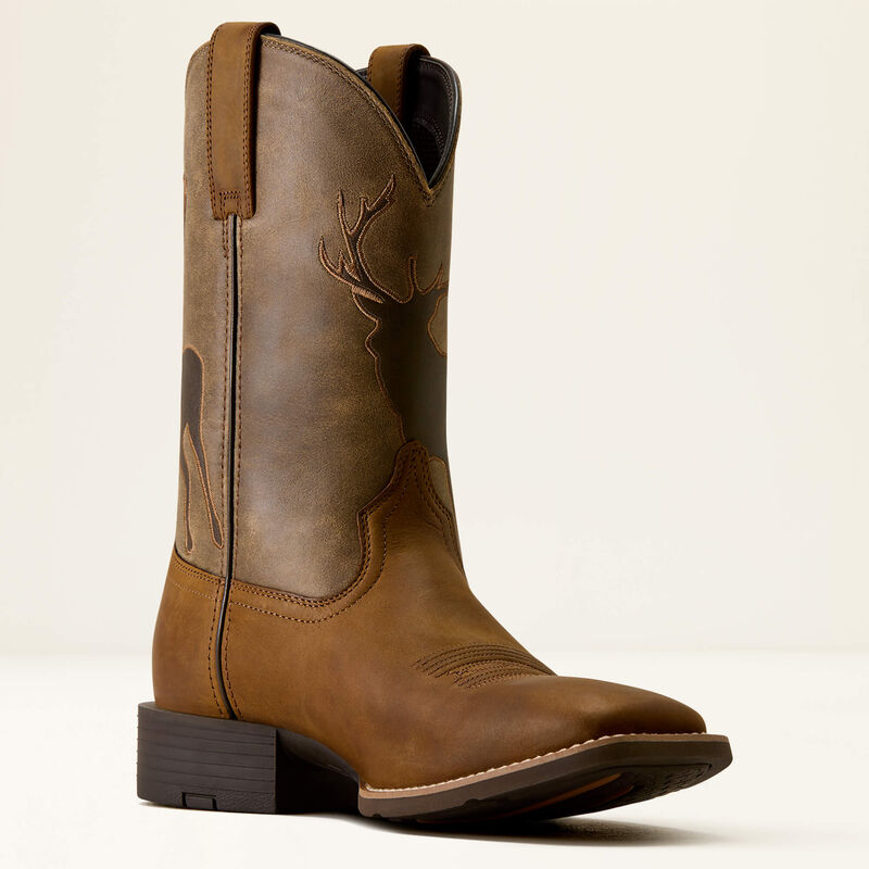 Brown leather Ariat boot with a deer printed on it on a white background