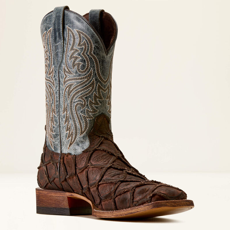 Leather boot from Ariat in blue and brown with a textured foot on a white background