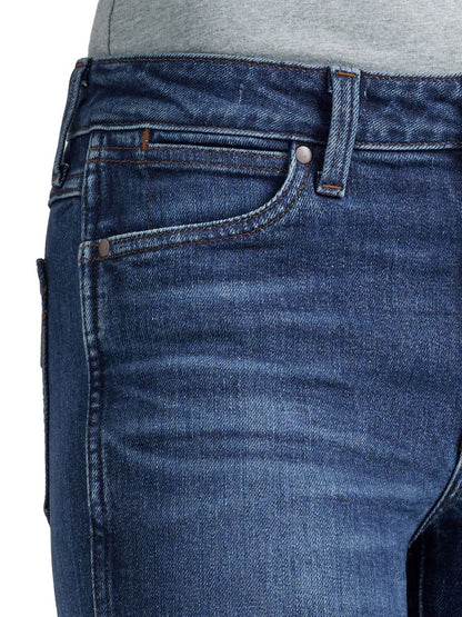 Close-up of blue jeans with a focus on the waistband and pocket area.