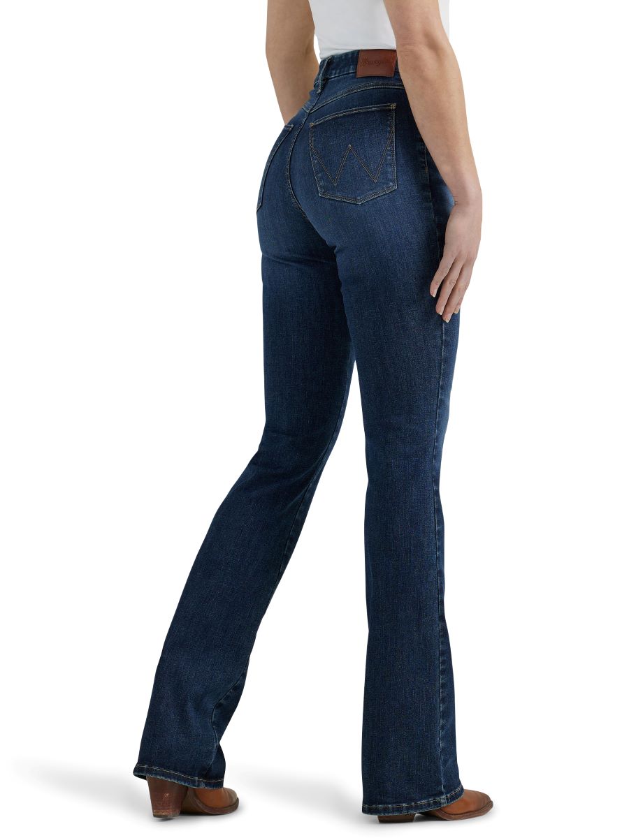 Person wearing dark blue jeans on a white background