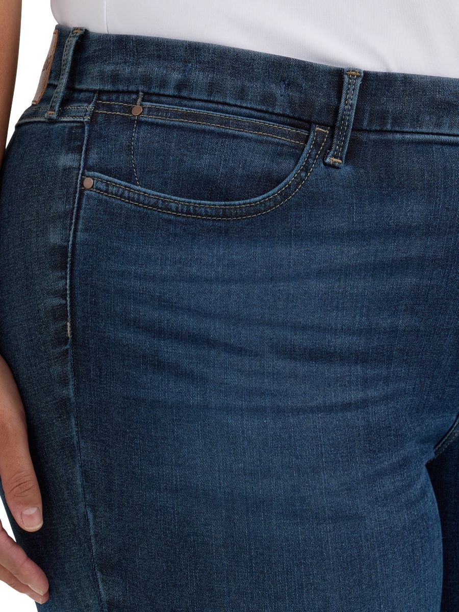 Close-up of blue jeans with a white background