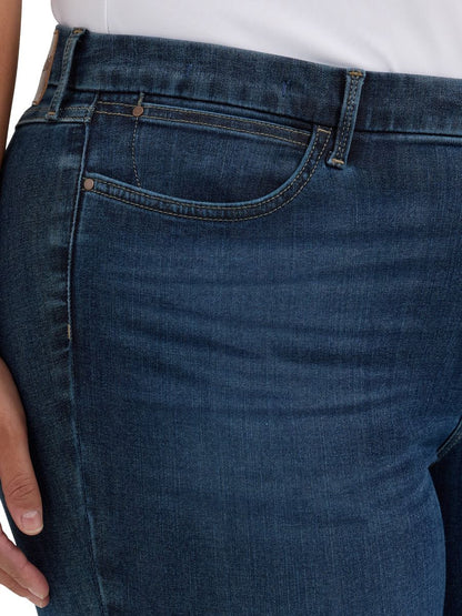 Close-up of blue jeans with a white background