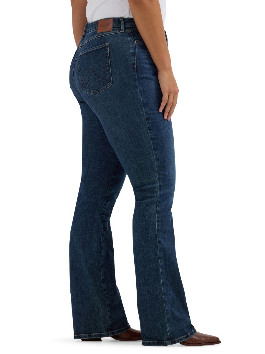 Person wearing blue jeans on a white background