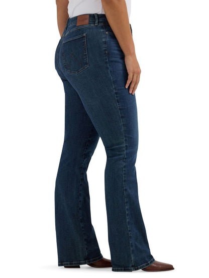 Person wearing blue jeans on a white background