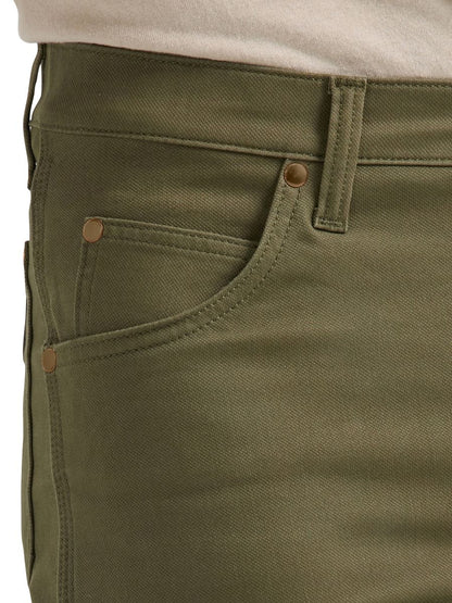 a close up of the front pocket of olive green wrangler cowboy but pants 