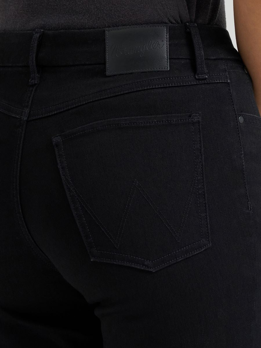 a close up of a pair of black bespoke jeans