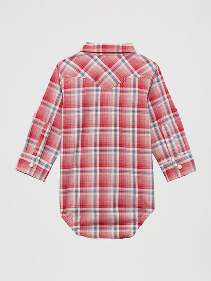 Red and white plaid baby shirt on a light gray background