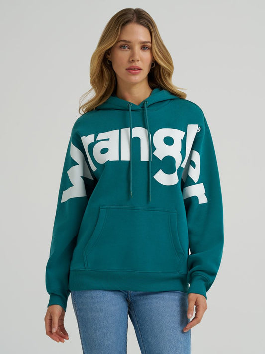 Person wearing a teal hoodie with a brand logo on a plain background