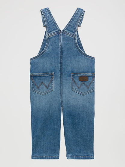 Blue denim baby overalls on a light gray background