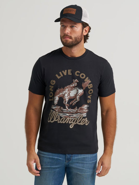 Man wearing a black t-shirt with Wrangler branding and a horse graphic on a plain background