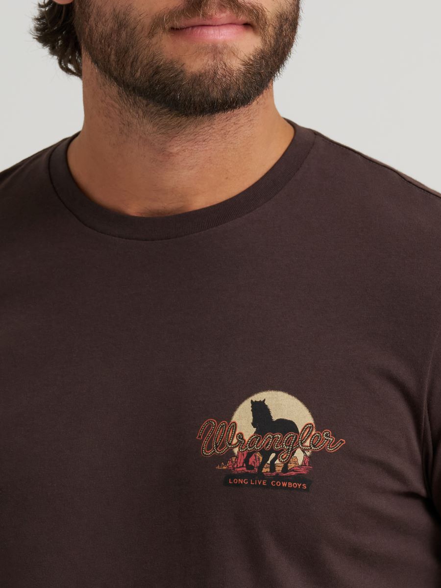 Man wearing a brown Wrangler t-shirt with a logo on the chest.