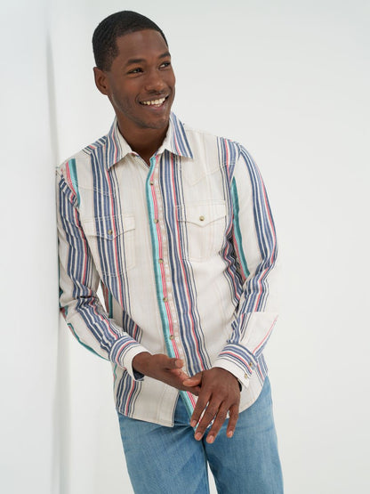 Man wearing a striped shirt Wrangler with a plain background